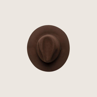 Top-down view of Anderson Brown packable fedora hat on neutral background