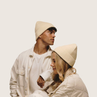 Couple wearing matching Will & Bear Bambi Custard yellow wool beanies, unisex and versatile for all-day wear.