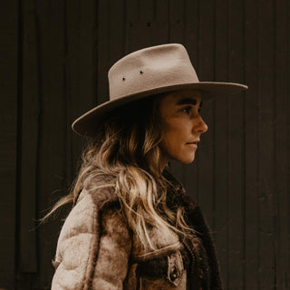 Side profile of woman wearing Will & Bear Brown Country Hat, styled for outdoor and country living