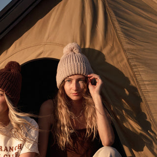 Will & Bear off white chunky knit beanie worn camping, cozy and durable for outdoor adventures