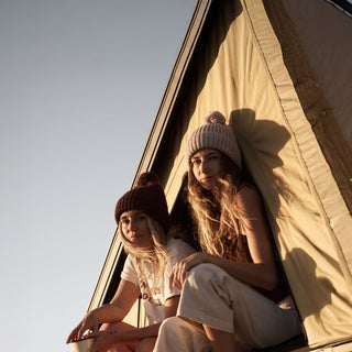 Will & Bear off white chunky knit beanie worn in nature, ideal for outdoor exploration and travel