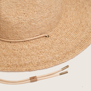 Detailed close-up of Will & Bear straw sun hat showing texture, weave and adjustable chin cord
