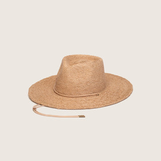 Will & Bear straw sun hat on neutral background, featuring wide brim and chin strap for sun protection and adventure-ready style