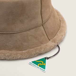 Detail of Will & Bear Beige Wool UGG Bucket Hat – Teddy Fawn – showcasing soft wool shearling edge and Australian Made tag.