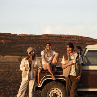Group outdoors featuring Will & Bear Beige Wool UGG Bucket Hat – Teddy Fawn – perfect for slow adventures and cozy conversations.