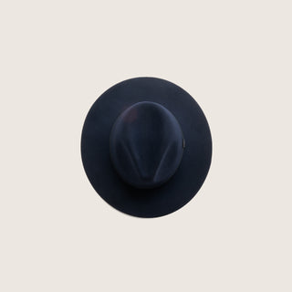Top view of Will & Bear Anderson Navy Soft Felt Fedora highlighting the smooth felt finish and structured crown