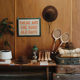 Will & Bear Woodley Auburn scout hat with lanyard styled with retro travel gear – ideal for outdoor adventures and slow living.