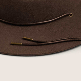 Close-up of Will & Bear Woodley Auburn scout hat lanyard – adjustable cord and natural felt finish shown in detail.