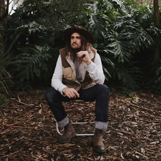 Man in Will & Bear Woodley Auburn scout hat with lanyard, styled for the outdoors and made from sustainable Australian wool.