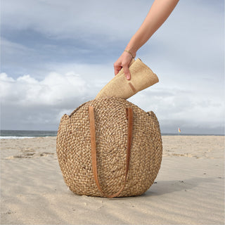 Will & Bear Crushable Straw Bucket Hat packed for beach day adventures, lightweight and travel-ready