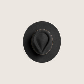 Overhead view of the Will & Bear Calloway Black wide brim hat showing crown shape and symmetry.