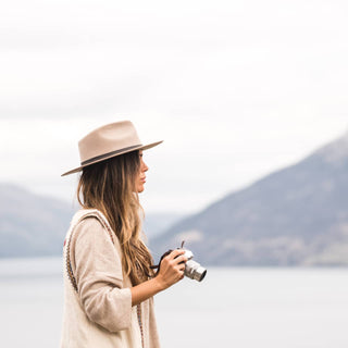 Woman adventuring outdoors in Will & Bear Felt Fedora Hat, crafted for travel and exploration