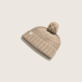 Will & Bear Soft Wool Beanie – Tasman Fawn – angled view highlighting ribbed knit cuff and pom pom top.