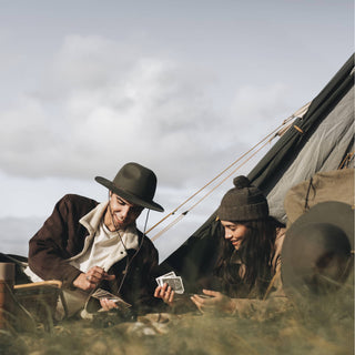 Couple at Campsite Wearing Will & Bear Wool Felt Gardening Hats – Perfect for Outdoor Camping Adventures