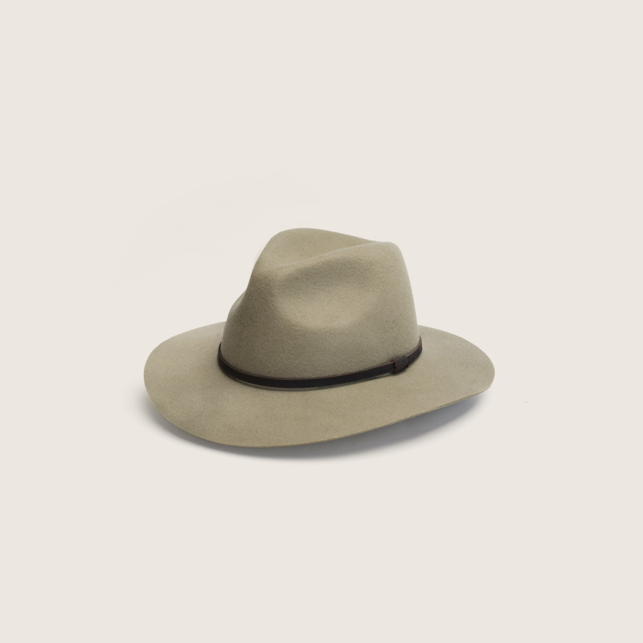 Front view of a sage coloured wide-brim floppy hat