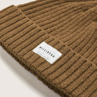 Close up photo of brown wool beanie