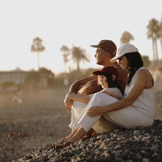 Family watching Sunset wearing the Archie Maroon kids hat