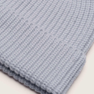 Close up view of Dust Blue knit beanie