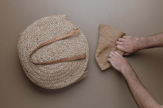 Straw hat being rolled