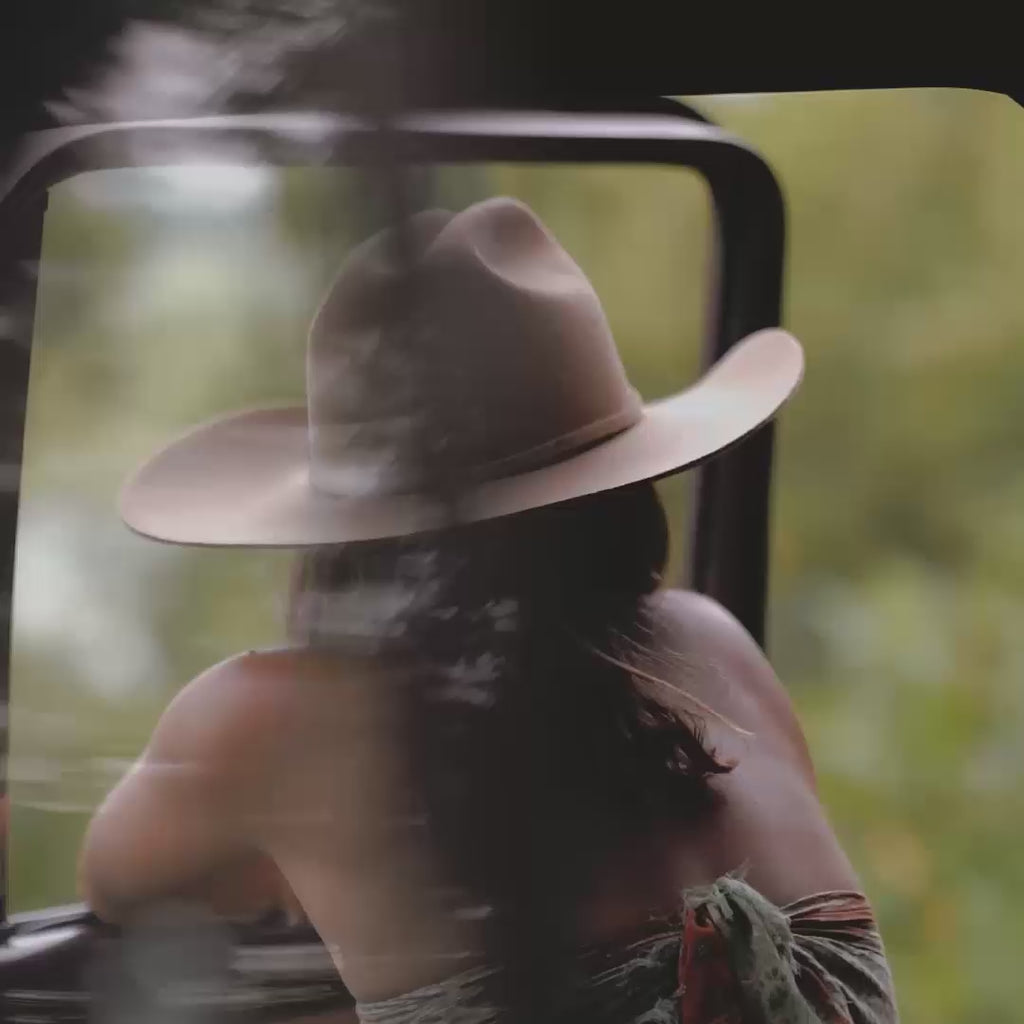 Crew hanging out wearing Buck Oak Brown cowboy hat