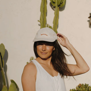 Woman wearing riley Bone Baseball cap