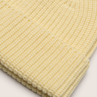 Detailed close-up of the Will & Bear Bambi Custard beanie showing premium merino wool knit pattern.