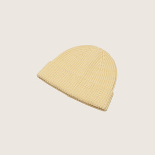 Will & Bear Bambi Custard yellow wool beanie made from soft merino wool, displayed on a neutral background.