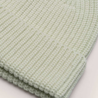 Close-up of the Will & Bear Bambi Sage green wool beanie featuring the fine merino knit texture and folded hem.