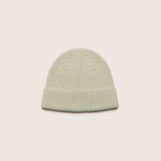 Top-down flat lay of the Will & Bear Bambi Sage green wool beanie showing its soft ribbed knit texture.