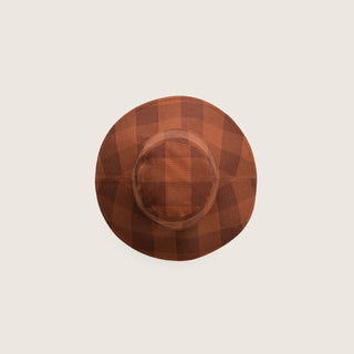 Top-down view of the Will & Bear Camp Bodhi Carob recycled hemp bucket hat highlighting check pattern and crown shape.