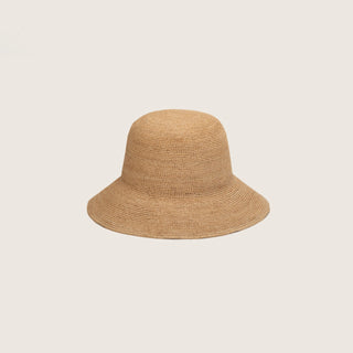 Will & Bear Sunny Sand Crushable Straw Bucket Hat made from natural raffia, displayed on neutral background