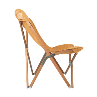 Side profile of the Will & Bear and Wandering Folk Slow Road Camp Chair showing durable timber frame and relaxed canvas seat.
