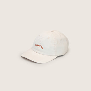 Will & Bear White Vintage Dad Cap – Riley Bone – side angle view showing embroidered "More Trees" slogan on natural cotton, displayed on a neutral background.