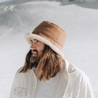 Man wearing Will & Bear Wool UGG Bucket Hat for winter warmth and rugged outdoor style