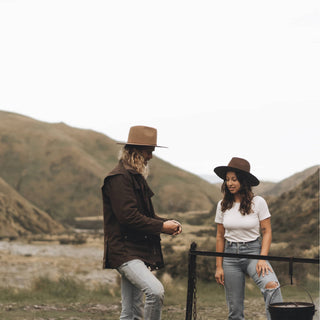 Man and woman outdoors wearing Will & Bear Brown Wide Brim Fedoras, ready for adventure