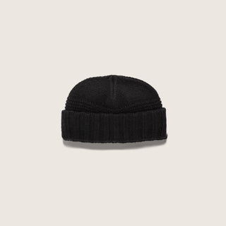 Straight-on view of the Will & Bear Doc Black Wool Fisherman’s Beanie showing shape and cuff detail on neutral background.