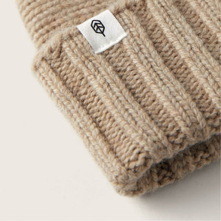 Close-Up of Will & Bear Little Tasman Fawn Kids Wool Cream Beanie – Natural Wool Ribbing and Label.
